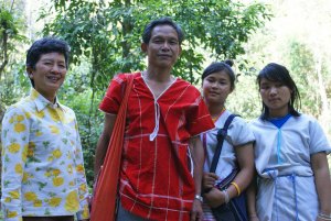 Khun Tuenjai with Mr Preeca Siri, leader of Huay Hin Lard Nai Village, Chiang Rai and his two daughters