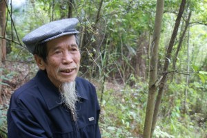 Luu Chi Kien, a very wise man, imparting local knowledge about the medicinal value of the many plants in the forest, carrying a global perspective